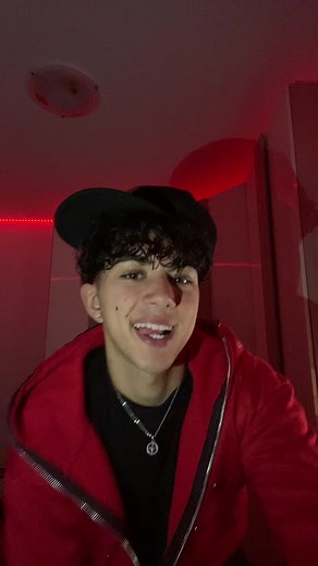 Engaging Dance Moves in a Moody Red-lit Room