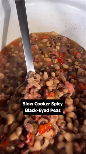 A hearty dish with no fuss! 🥣❤️ These Slow Cooker Spicy Black-Eyed Peas with ham and bacon are spiced up with jalapeño pepper and cumin for a delicious side dish or meal. Be sure to click the link in the @allrecipes bio to get the full recipe details! 😉 Directions: Gather all ingredients. Pour water into a slow cooker; add bouillon cube and stir to dissolve. Stir in black-eyed peas, ham, bacon, onion, bell pepper, jalapeño, garlic, cumin, black pepper, cayenne pepper, and salt. Cover and cook 