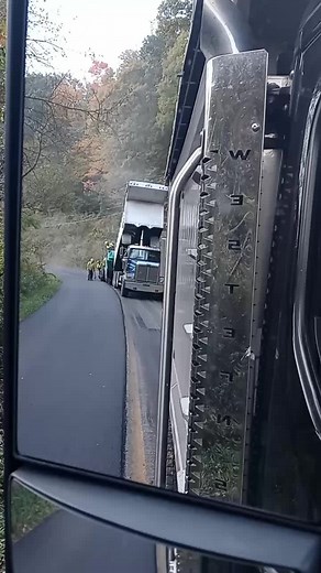 Truck Inspection by the Side of a Winding Road