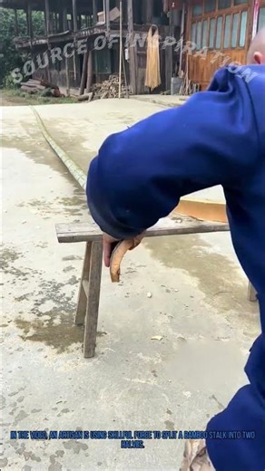 Traditional Bamboo Craft: Artisan Splitting Bamboo into Two with Skillful Force