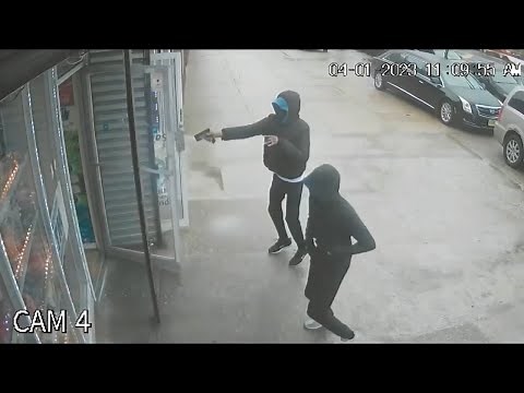 Video shows gunman firing shots into Philadelphia store