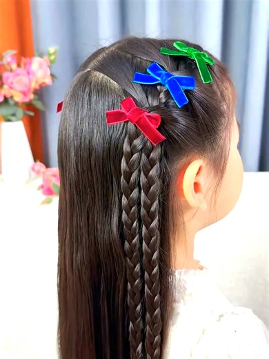 Master a stunning hairstyle with our easy-to-follow tutorial! This look combines sleek braids with a polished finish, perfect for any occasion. Follow the steps below to create this elegant style: 1. Start the Base Braid: - Begin by sectioning a small portion of hair at the crown. - Create a simple three-strand braid on one side. Secure the end with a hairpin or elastic. 2. Add Side Braids: - Take a small section from the side of the head, parallel to the first braid. - Braid it tightly and secu