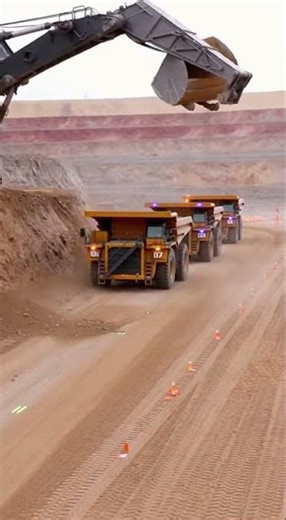 Driverless Dump-Truck Convoy in Action