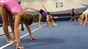 October 10, 2019 Hannah leading 4:30 Thursday group in warmups (pt.2) Our warmup takes up about 20 min with first 10 minutes on leg work/running, 10 min active stretching with some shaping/conditioning, leaving us with time for 5-10 min of line drills. | Gymnastics World