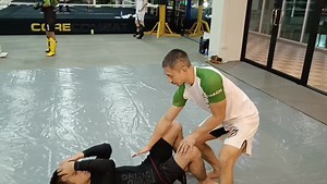 MMA transition drill - knee slice to crucifix and V-Armlock finish. #mixedmartialarts #martialarts #chiangmaimartialarts #corecombatchiangmai #chiangmaithailand #mma #chiangmaimma #chiangmaifitness | Core Combat Chiang Mai