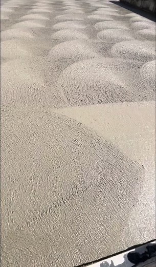 Swirling Action: Tiling Area with Concrete Finishing Techniques