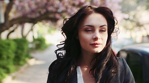 Young Woman Walking Down City Street Smiling Stock Footage SBV-319351203 - Storyblocks
