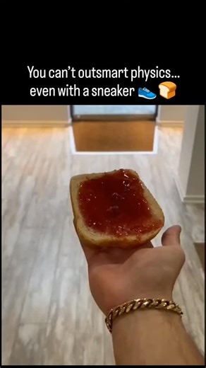 explains universe🌐 on Instagram: "This clip plays with the famous “buttered toast effect,” where toast flips in mid-air and almost always lands spread-side down thanks to gravity acting on its uneven weight. The twist? Someone tapes the jam-covered toast to the bottom of a shoe and drops it—only for it to land jam-side up, hilariously mocking our endless attempts to beat everyday physics. Scientific studies and real-world tests show that from normal table heights, toast naturally rotates just e