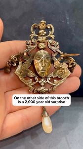 An ancient Roman emerald carved with the features of a man's face is the center stone of this 19th-century brooch. The art of gem carving takes years to learn and master, and emeralds are notoriously difficult to carve. They polish well, but the artist must be extremely careful not to break the stone or carve away too much of the gem during the process. To find a carved emerald dating to antiquity, when gem carving was in its infancy, is an exceptional rarity.View more details on our website. It