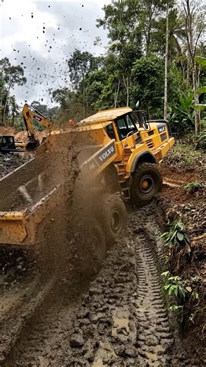 Loader stuck in deep mud Can it escape? #loader #heavymachine #stuck #muddyroad #rescue #shortvideo