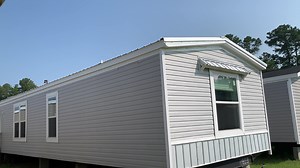 Lansing from Hamilton Home Builders 3 bed, 2 bath single wide 2x6 walls, metal roof, tub and shower in master bath, much more! Call Lee! 910-318-5005 | Marty Wright Home Sales - Laurel Hill