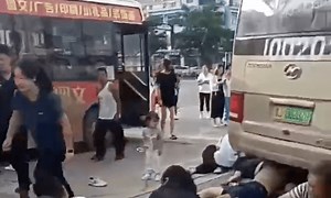 China school bus crashes into crowd, kills 11 including students