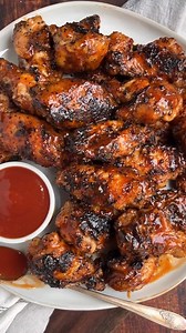 Crispy grilled chicken wings finished with a homemade Honey Bourbon BBQ Sauce. A delicious chicken wing sauce to add to your wing night rotation. Recipe --> https://www.vindulge.com/honey-bourbon-grilled-chicken-wings/ . . . If your grill is too hot (over 450 degrees F) then the chance of the wings scorching or burning is high. Control the temperature and keep at or around 400 degrees if you can. Otherwise if your grill gets too hot then start the wings on the indirect side of the grill and then