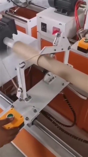 The process of winding thread into a roll using a special machine#youtubeshorts #trending