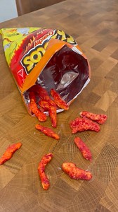 Flaming Hot Cheetos but it’s cake. #cake #cakesofinstagram #cakedecorating #cheetos | Jonnycakes