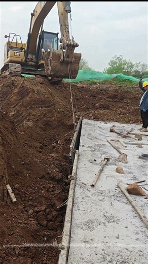 Using Excavator to Pull Out Heavy Steel Formwork at Site