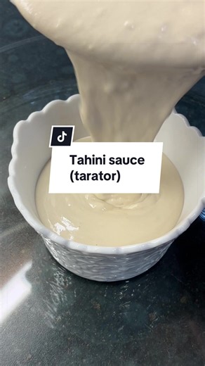 How to make tarator (tahini sauce) Ingredients: 130ml tahini 110ml water Juice of 1 lemon 2 cloves of garlic (crushed) Salt Enjoy ❤️ #tahini #creamy #easyrecipes #lebanesefood