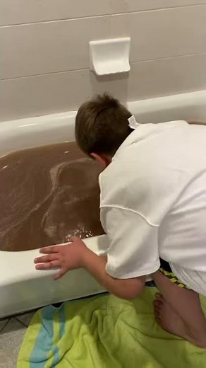 Augustus Gloop falls in the chocolate river!