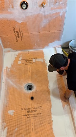 @jp_stile on Instagram: "How do you check your slope! #schluter #rep #work #diy #instagood #plumbing #tile #interiordesign #luxuryhomes #howto #design #orange #waterproof #funny #slope #stabila #ball #architecture #engineer"