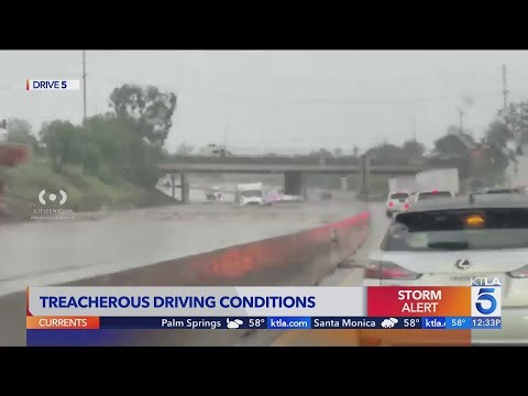 Storm Alert: 5 Freeway submerged under floodwaters