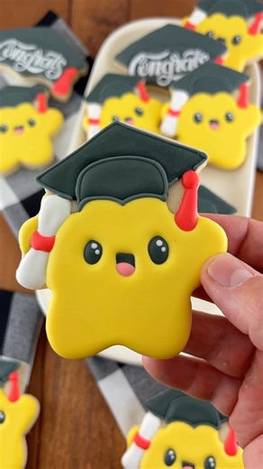 Mike | Semi Sweet Designs on Instagram: "Graduation season just got sweeter! Learn how to decorate this adorable star grad cookie—complete with a cap and diploma! Full tutorial + cutter available in our shop! #cookiedecorating #graduationcookies #royalicingcookies #cookietutorial #semisweetdesigns #graduation2025 #customcookies"