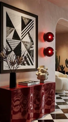 Red wavy console glows on marble. Bold red, black-white drama, geometric art & crimson lights.