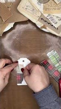 simple collaged tag with Christmas backdrops by Tim Holtz