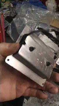 Mounting plate for a Alpine PXE-C60-60 DSP controller in the ashtray of 93 Chevy OBS