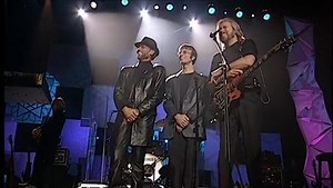 Live by Request é um programa de TV que teve a participação dos Bee Gees em comemoração aos 35 anos de carreira.. Foi o último registro de um show dos 3 juntos, já que 2 anos depois falecia Maurice Gibb de ataque cardíaco. O próprio Maurice foi um show a parte do espetáculo, fazendo graças com os irmãos e a platéia. Foi gravado em Abril de 2001. | Bee Gees World Tribute