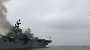 Navy charges sailor in fire that destroyed warship