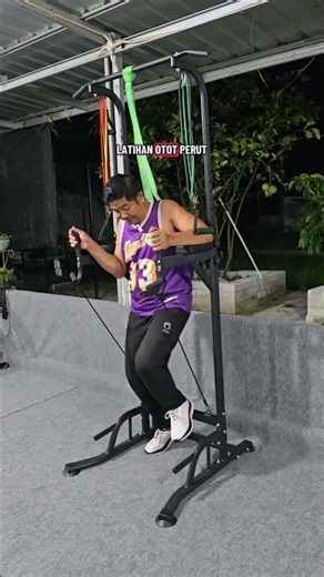 Home gym with a power tower pull-up bar
