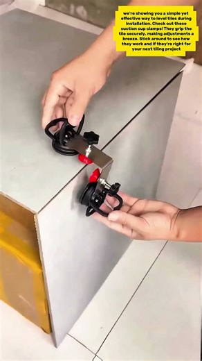 Tile Installation Hack: Leveling Made Easy with Suction Cup Clamps!