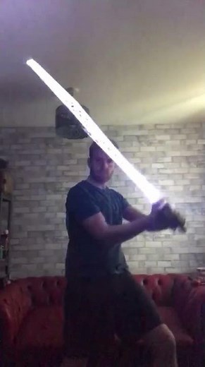 Guy Accidentally Breaks His Glow up Sword While Practicing With it - 1191132