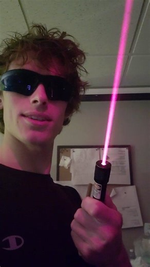 Here I use a strong laser as an "optical trap" to capture particles at the focal point #science #laser | Styropyro