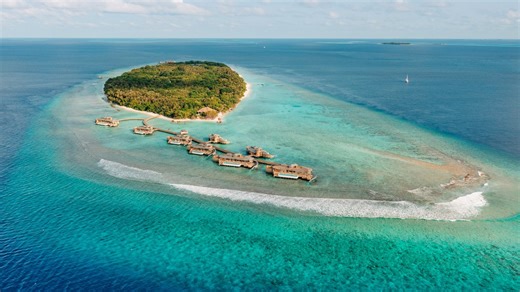 Inside the most expensive resort in the Maldives with floating villas & slides