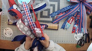 6.3K views · 104 reactions | Big multi-ribbon bows have been selling well on Etsy for Coach Mellie Mel, so she decided to drop a new video tutorial featuring patriotic themed bows! Who's ready to try these?? Check out her blog tutorial here: https://howtomakewreaths.com/multi-ribbon-patriotic-bow-tutorial/ | DecoExchange | Facebook