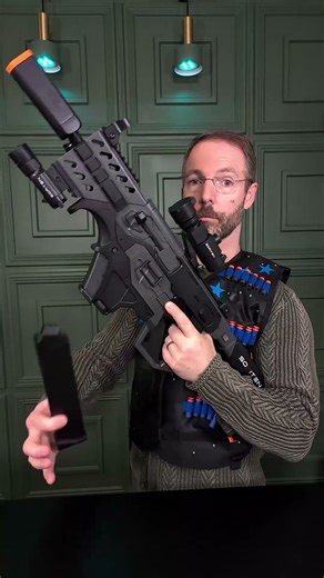 This tactical dart blaster gives you the advantage with laser sight, flashlight, zoomable scope and