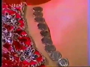 Belly Dances does crazy Flip Coins Trick with her Belly