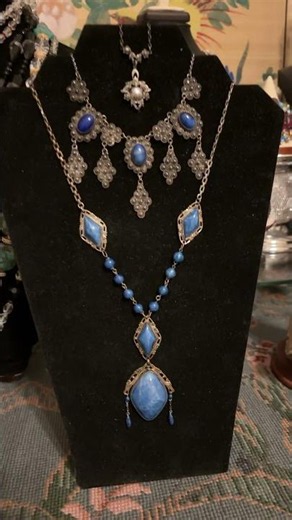 Beautiful blue glass vintage necklaces available for immediate purchase.