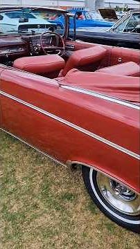 The B-52s in their Chrysler that's as big as a whale and seats about 20 on the way to the Love Shack