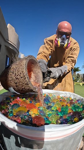 Pouring golden metal into Orbeez #artist #physics #physic #artistsoftiktok #forge