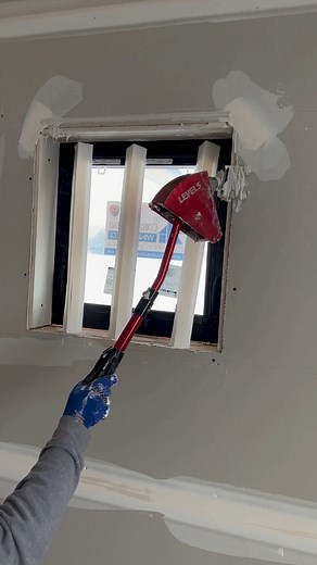 Installing some tape on bead with a bead head angle adapter | Drywall Shorty