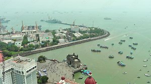 Mumbai: Aerial view of city in India, famous monument Gateway Of India Mumbai - landscape panorama of South Asia from above