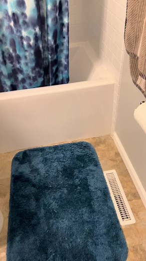 Cat Struggles with Jumping Out of Deep Tub