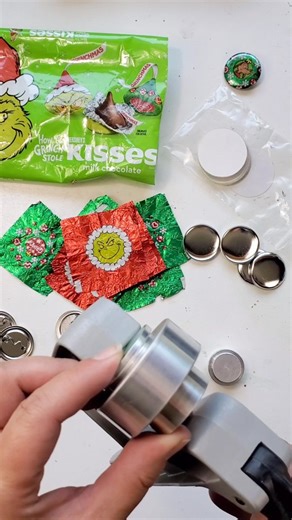 Save those candy wrappers for buttons! . #buttonbadge #pinback #pin #pinstagram #badgeaminit #buttons #pinbackbutton #candywrapper #hersheykisses #thegrinch #grinch #grinchmas #grinchy #grinchchristmas #dumdums #button #pins #flair #backpackflair #jeanjacket #denimjacket #jacket #Doodlecraft #Doodlecraftblog | Doodlecraft