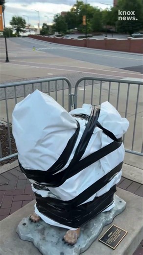 Statue of Tennessee football mascot Smokey I damaged in front of Neyland Stadium