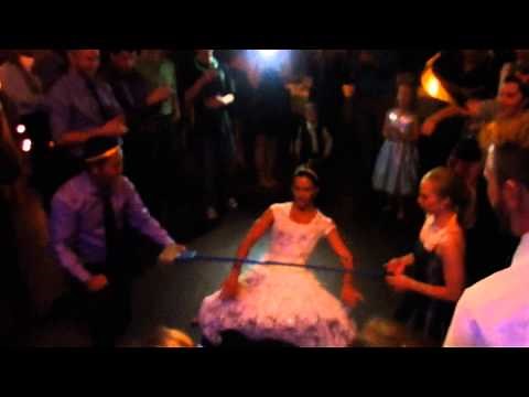 Bride wins limbo... in her dress!