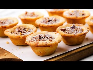 Mini pecan tassies with gooey filling and buttery crust—easy holiday treat everyone loves!