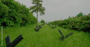 Antitank hedgehog. Defensive line of anti-tank hedgehogs. Anti-tank defense.