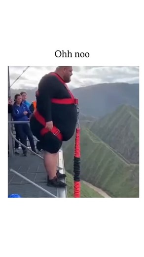 street_decode on Instagram: "The post features a 15-second AI-generated video of an overweight man bungee jumping from a cliffside platform into a valley, where he dramatically impacts a star-shaped safety net, creating an exaggerated dust crater that defies real physics. Posted by content creator @AnbuRjs on 28 December 2025, it quickly went viral with 7.9 million views and 15,000 likes, sparking reactions of shock ("Oh no!") mixed with laughter and concern for the jumper's safety. Over 1,400 r